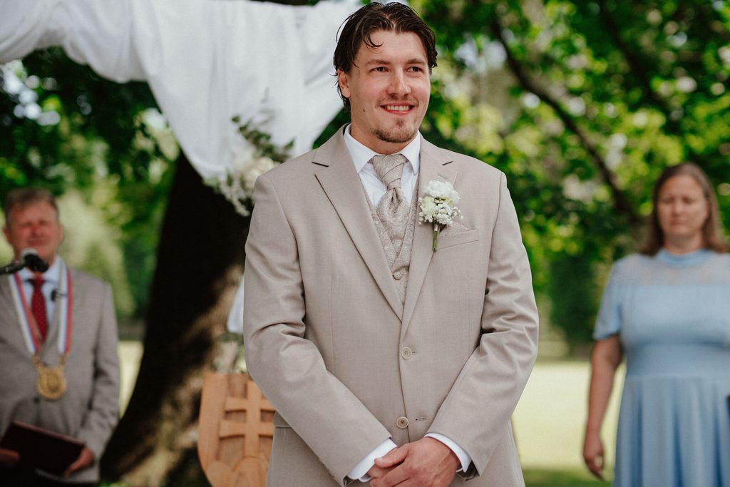 The groom waiting for the bride at the altar, wedding at Chateau Appony, Oponice