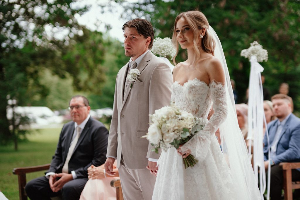 The couple at the altar, wedding at Chateau Appony, Oponice