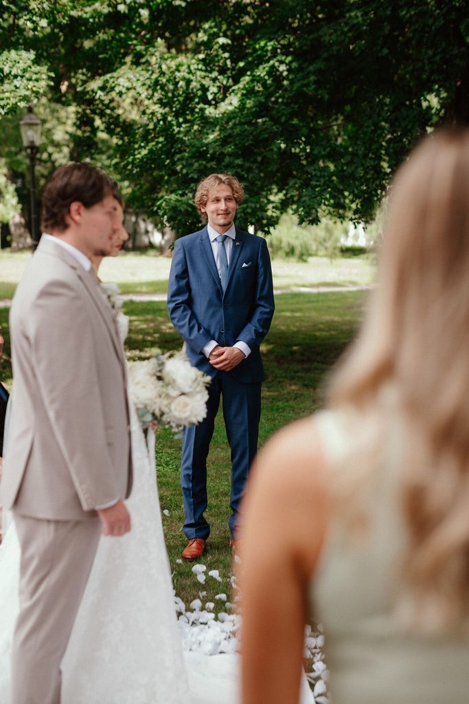The groom looking at the bride during the ceremony, wedding at Chateau Appony, Oponice
