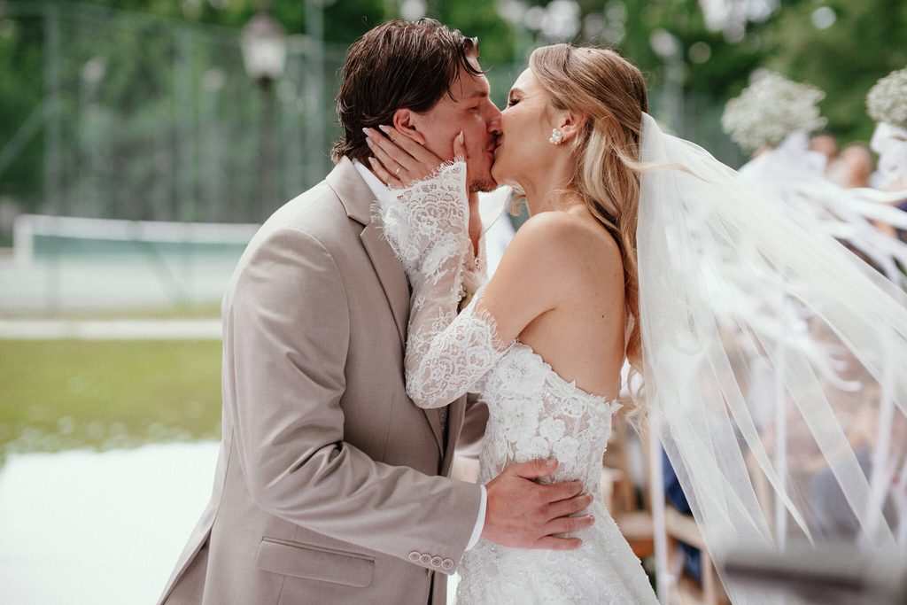 The newlyweds' first kiss, wedding at Chateau Appony, Oponice
