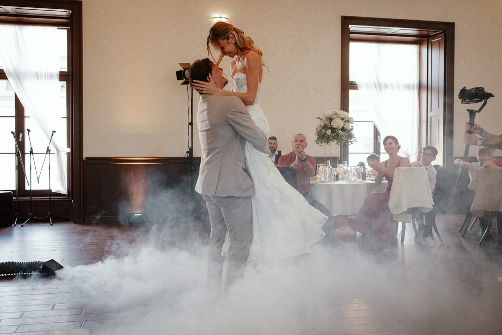 The newlyweds' first dance in the haze, wedding at Chateau Appony, Oponice