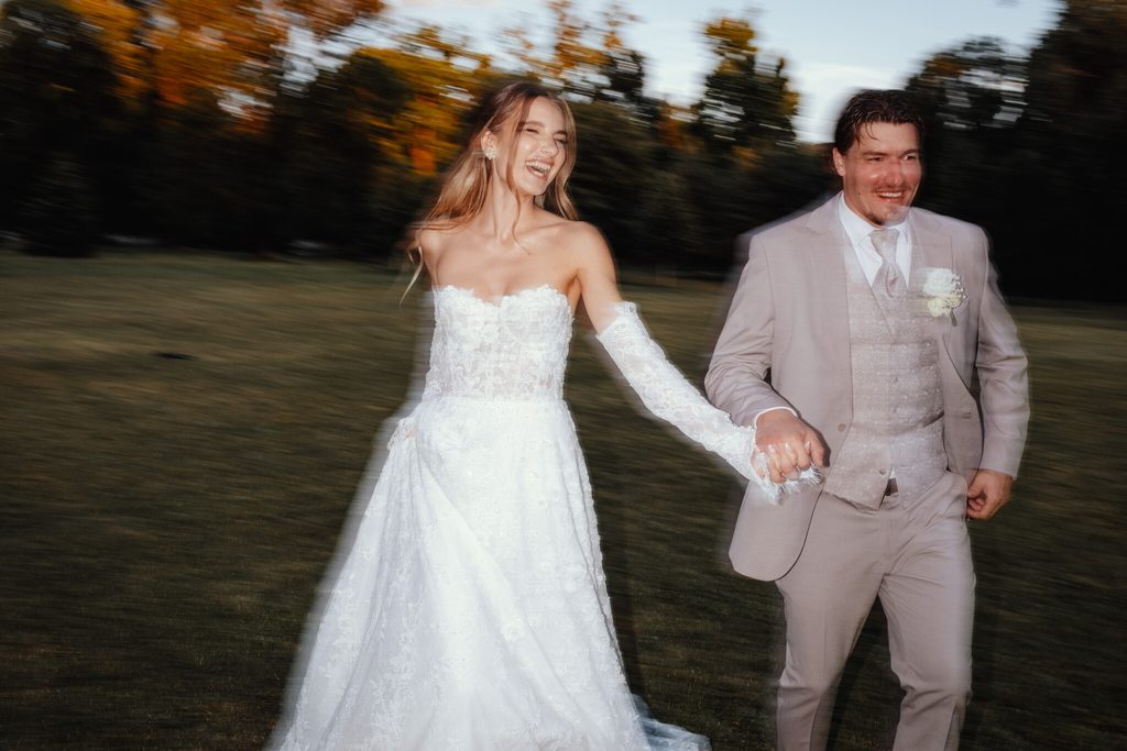 The newlyweds holding hands in the park, wedding at Chateau Appony, Oponice