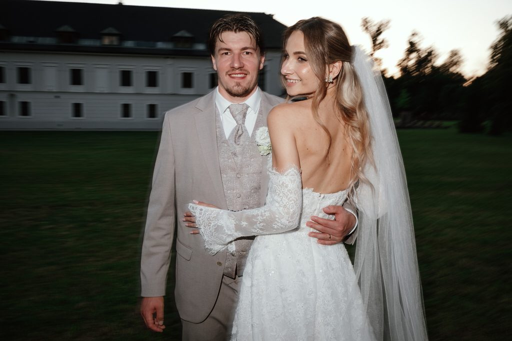 The newlyweds outside the chateau in the evening, wedding at Chateau Appony, Oponice