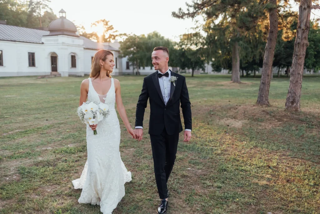 Newlyweds in front of Château Rúbaň during evening portraits